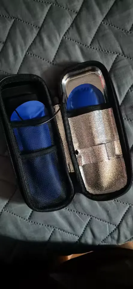 Customer photo: the case open on a quilt with both ice packs inside