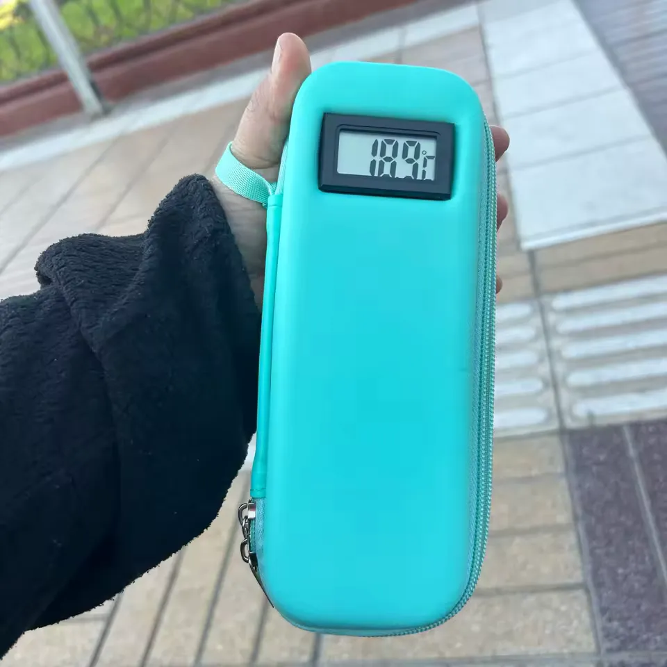 Customer photo: a teal case held up outdoors, temperature on the display